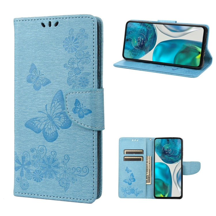 Blue leather flip phone case with butterfly emboss, side strap, and card pocket