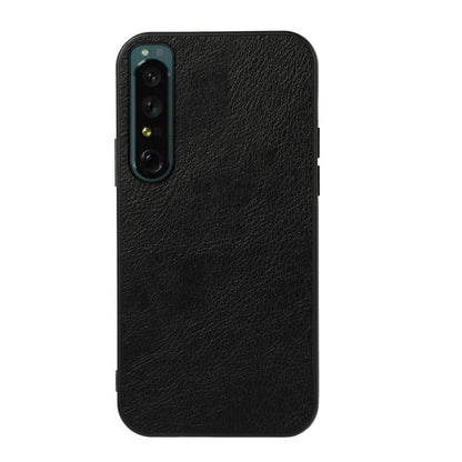 Two-tone PU litchi-texture phone case, black; camera module cutout and ports.