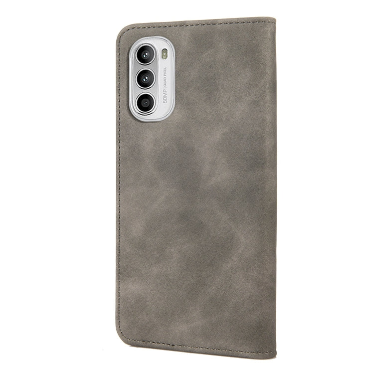 Grey leather phone case with camera cutouts and stitched edges