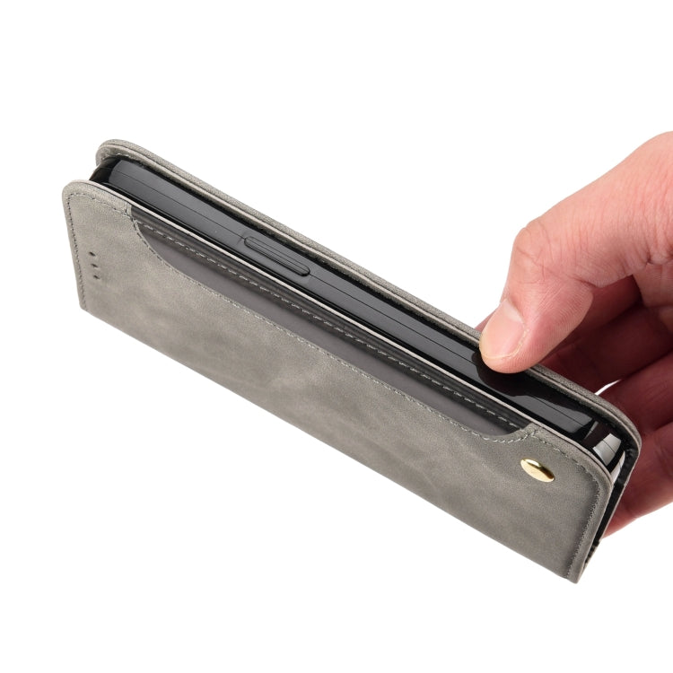 Grey leather wallet phone case with inner side pocket and magnetic snap