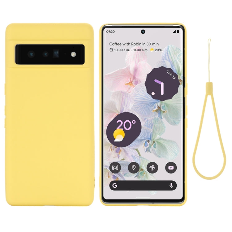 Yellow liquid silicone shockproof phone case with camera cutout, with wrist strap