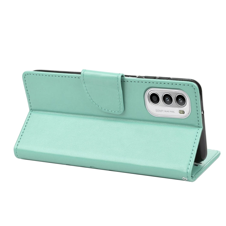 Green flip leather phone case with side view and triple camera cutout