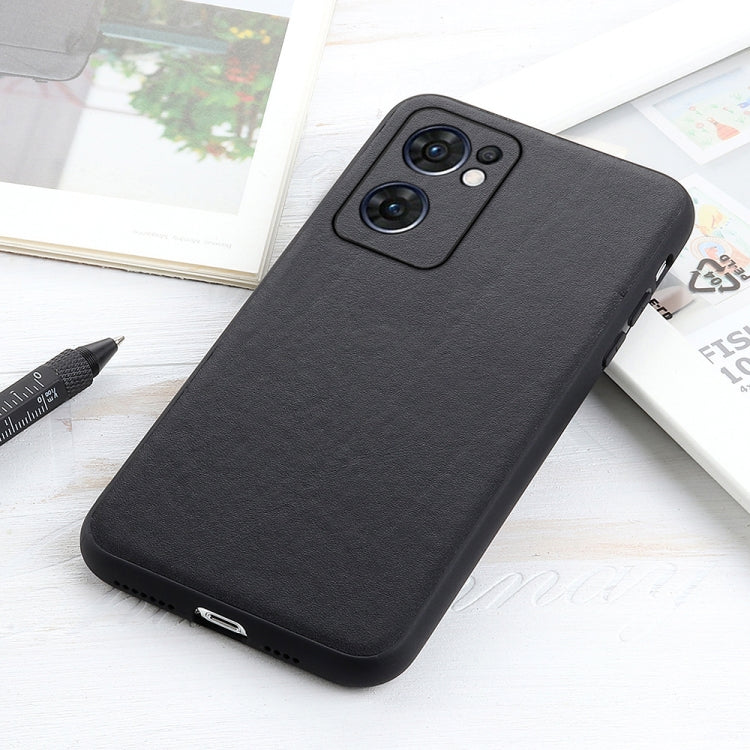Black textured leather phone case with raised camera frame and side cutouts