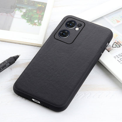 Black textured leather phone case with raised camera frame and side cutouts