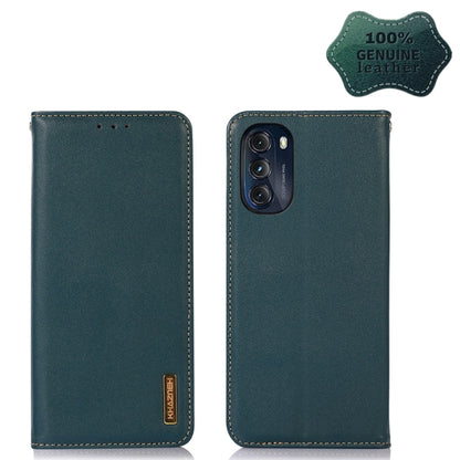 Green leather phone case with vertical design, stitched edges, and logo patch on side
