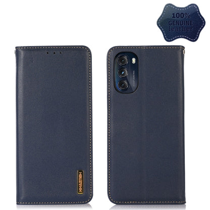 Navy leather phone case with camera cutout, stitched edges, and side logo label
