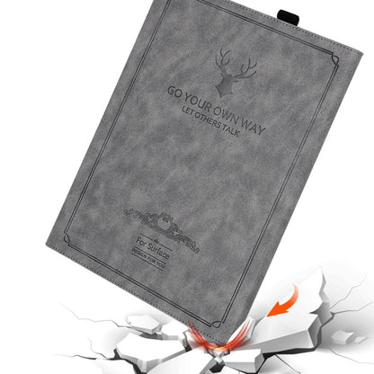 Grey tablet leather folio case with deer head emblem and decorative bottom graphic