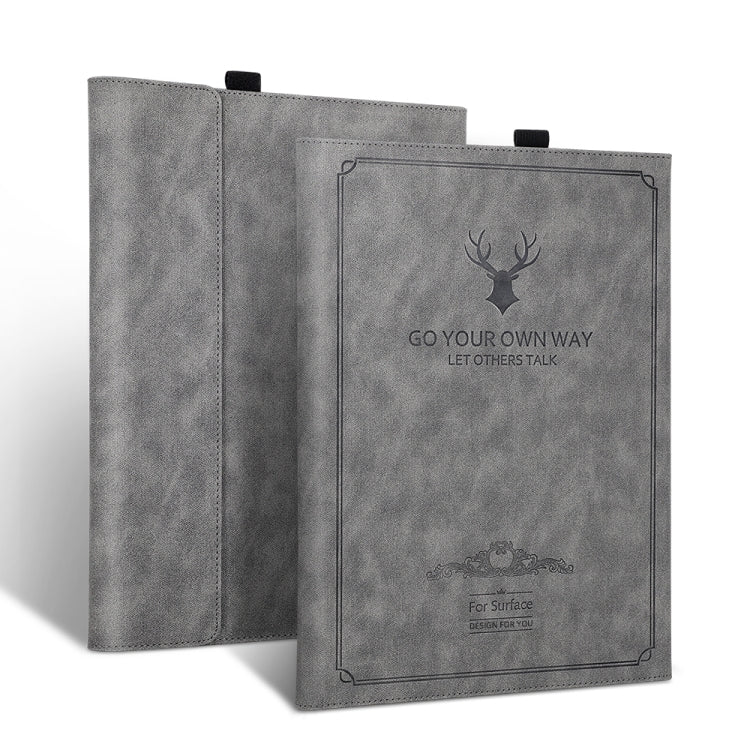 Grey tablet leather folio case with deer head graphic and embossed corner border