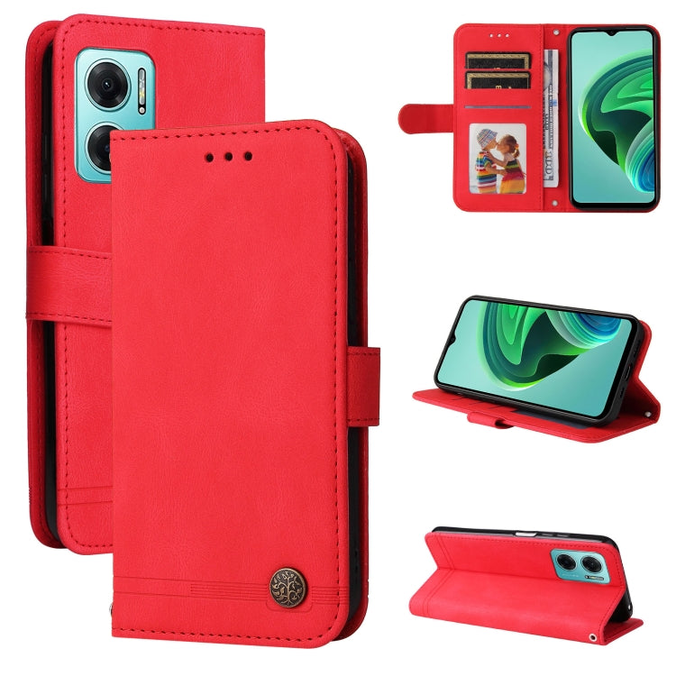 Red leather folio phone case with card slots, magnetic button, and stand
