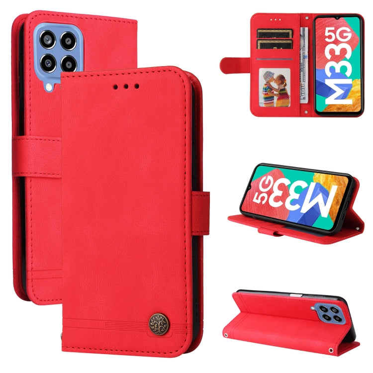 Red leather phone wallet case with card slots, metal button, and dual-camera cutout