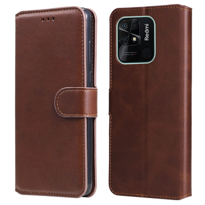 Brown calf-texture leather flip phone case with side strap and stitched edges.