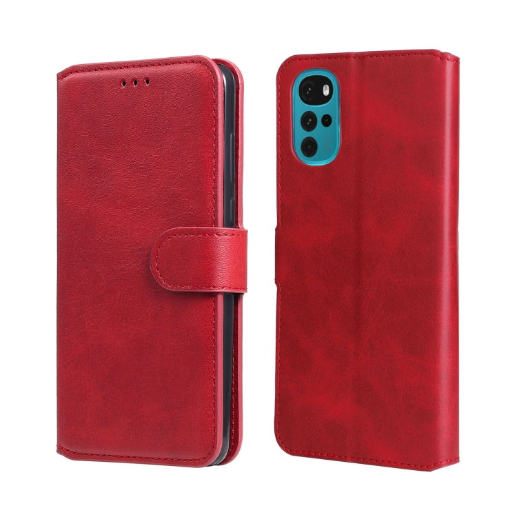Red flip leather phone case, front cover with side strap, back view with camera area.