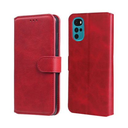 Red flip leather phone case, front cover with side strap, back view with camera area.