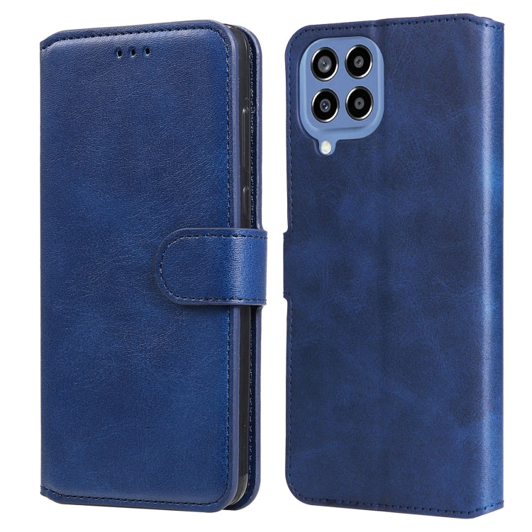 Blue flip leather phone case with front cover and side strap, camera cutout on back.