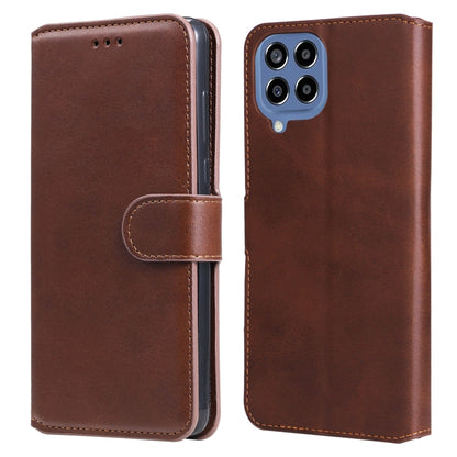 Brown calf-texture leather flip phone case with side strap and multi-camera cutout.
