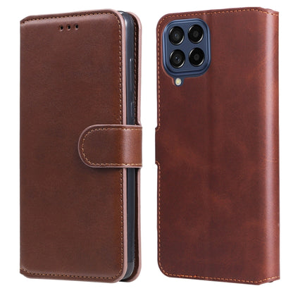 Brown leather flip phone case with side strap and four-camera back opening.