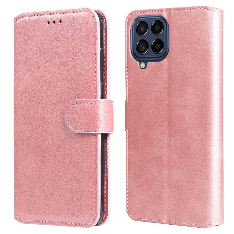 Rose pink leather flip phone case with textured finish and quad rear camera cutout