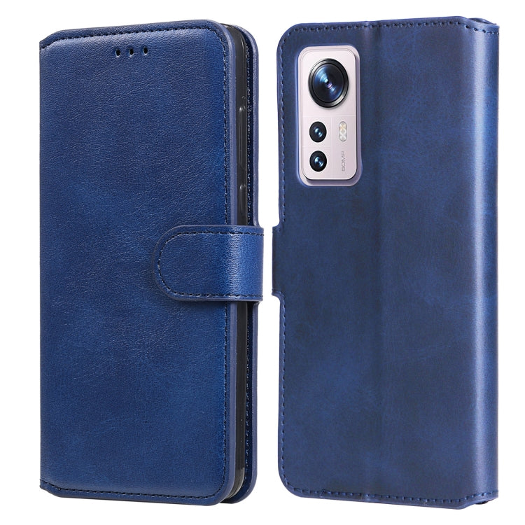 Blue flip leather phone case showing camera cutout and front cover with side strap.
