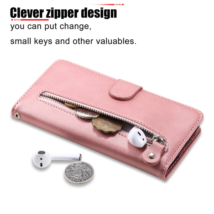 Rose gold leather phone case with zipper pouch for small valuables and fold-over strap
