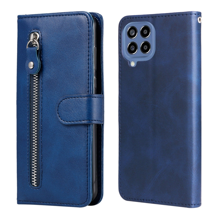 Blue leather phone case with zipper, flip cover, and card holder; quad camera cutout.