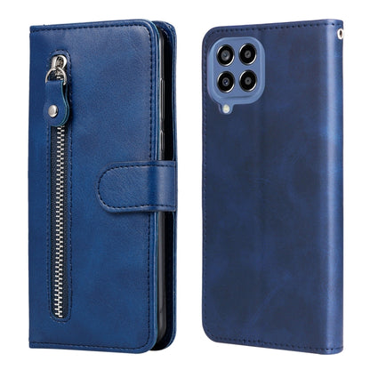Blue leather phone case with zipper, flip cover, and card holder; quad camera cutout.