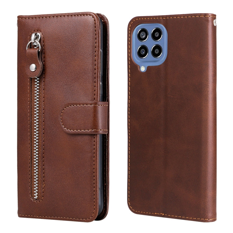 Brown leather phone case with zipper, flip cover, and card holder; quad camera cutout.