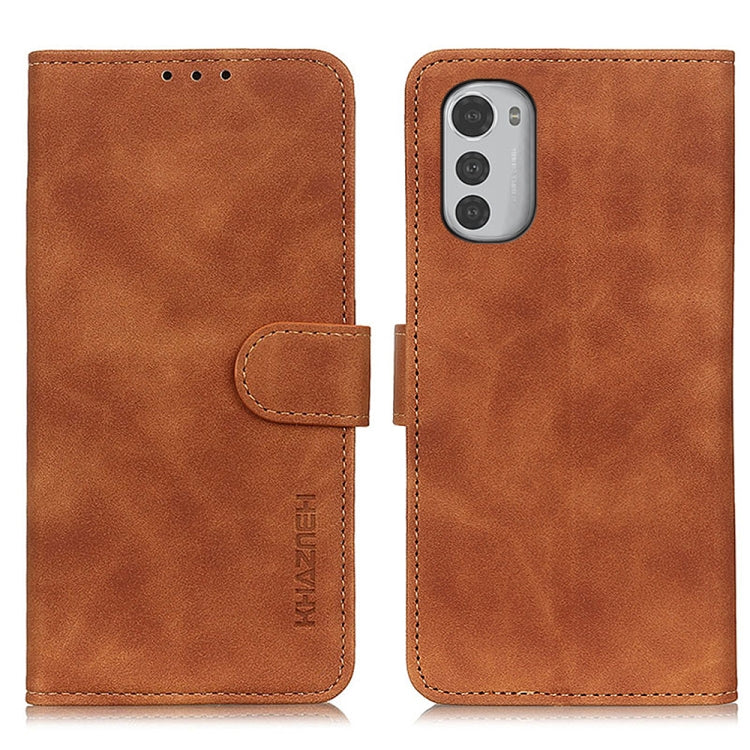 Brown leather flip phone case with camera cutout and side button cover