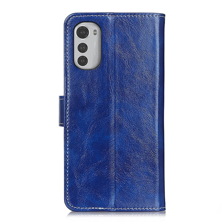 Blue flip phone wallet case with camera cutout and textured leather finish