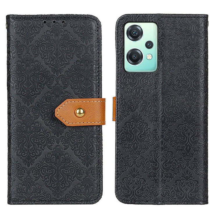 Black embossed floral flip phone case with brown clasp and cutout for dual cameras