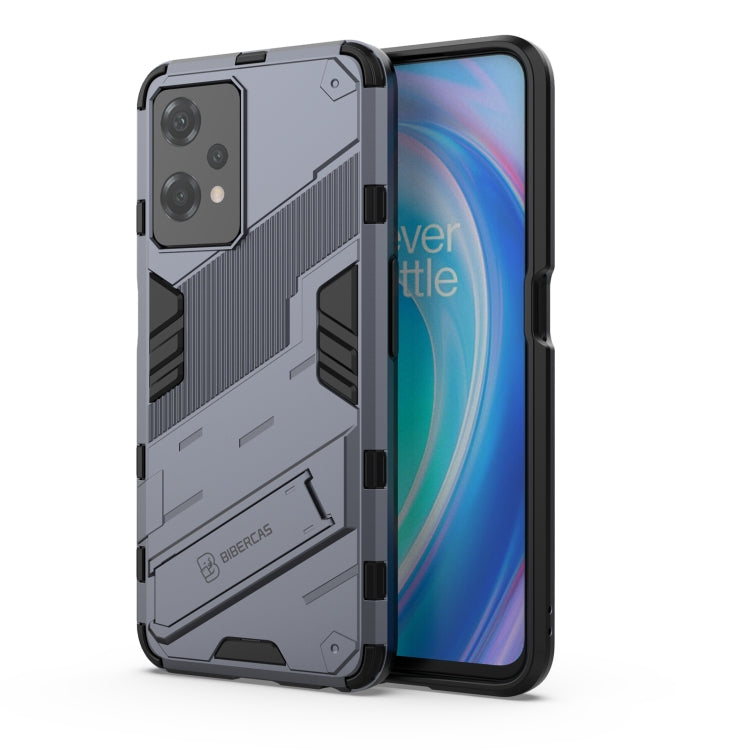 Grey shockproof phone case with kickstand, rugged armor texture, protective back