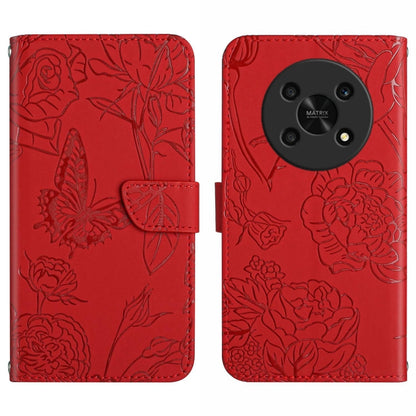 Red embossed leather folio phone case with floral butterfly pattern and side strap