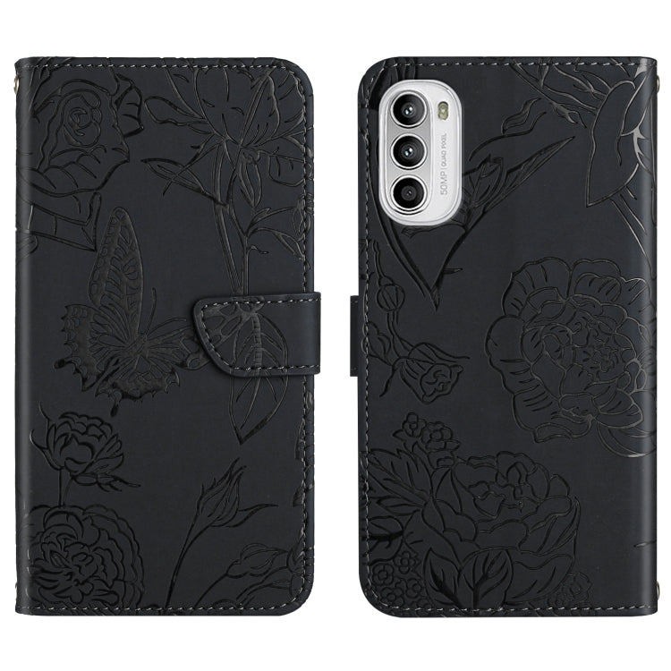 Black embossed leather folio phone case with butterfly and peony floral pattern