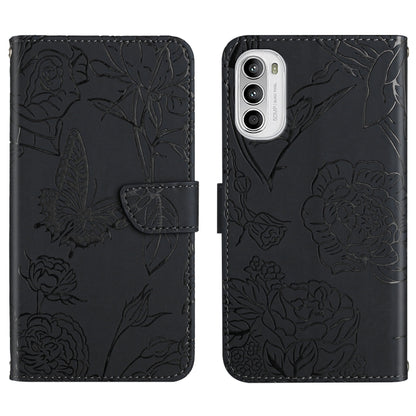 Black embossed leather folio phone case with butterfly and peony floral pattern