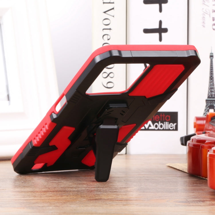 Armor phone case in red and black with stand raised and camera cutout visible