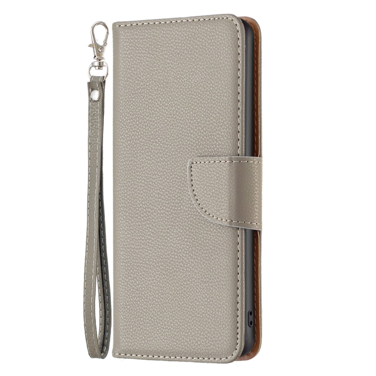 Grey leather folio phone case with front flap and stitched snap closure