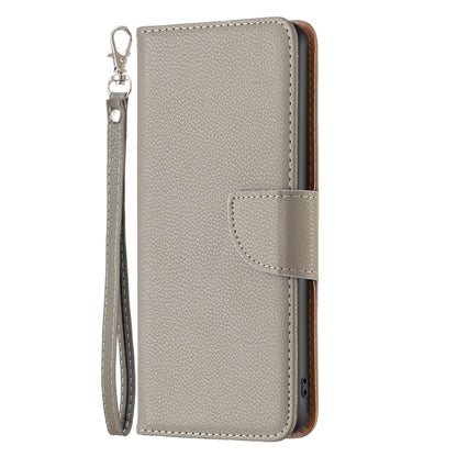Grey leather folio phone case with front flap and stitched snap closure
