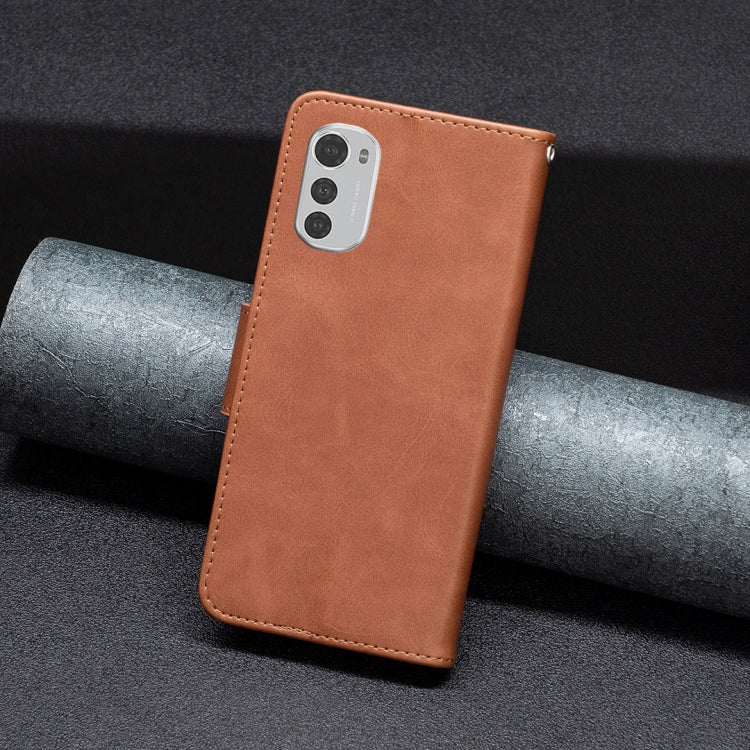 Brown leather phone case with camera cutout and flip pocket, front view