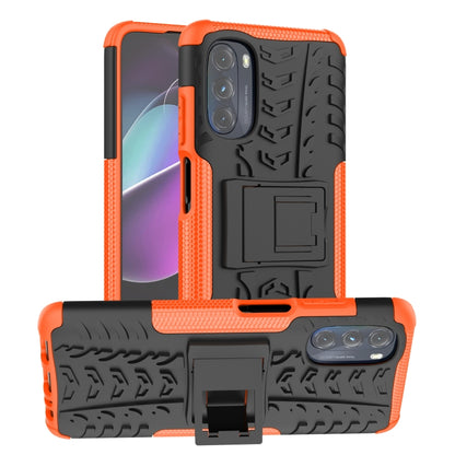 Rugged phone case with holder, tire-textured orange and black TPU+PC