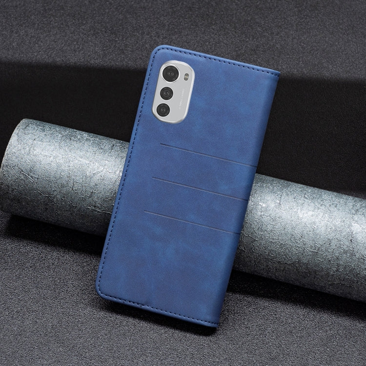 Blue leather phone case with camera cutout and magnetic flip closure