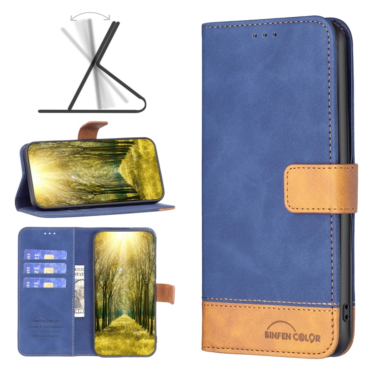 Leather phone wallet case, blue with tan magnetic strap and stitched bottom pocket.
