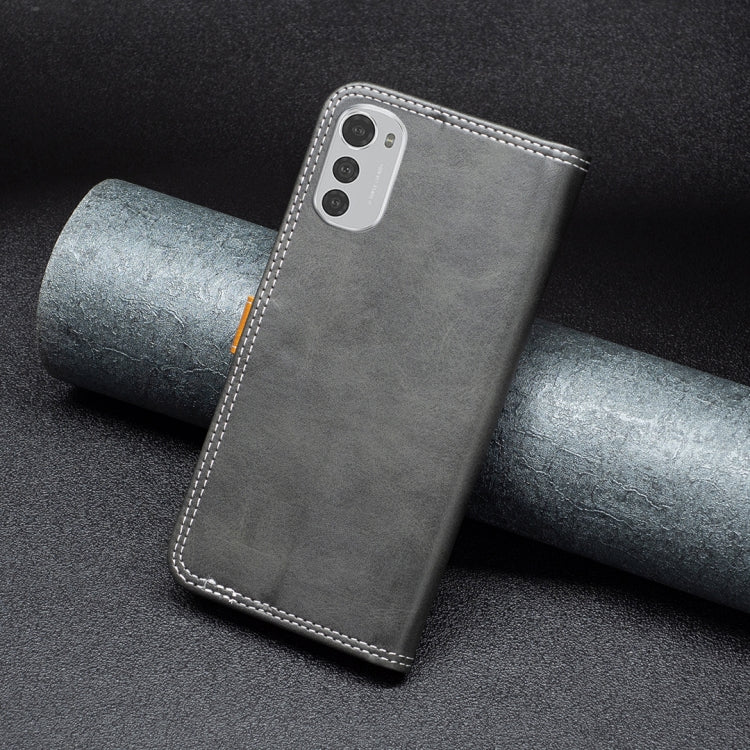 Gray leather phone folio with camera cutout and double-stitched trim