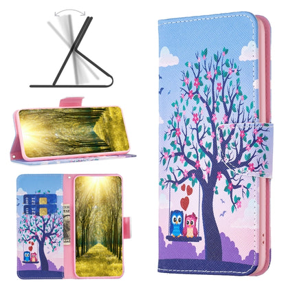 Light leather phone case with pink-blue tree and owl and butterfly design