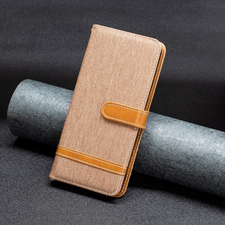Tan textured folio phone case with wrist strap and stitched horizontal band