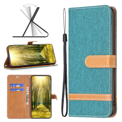 Teal textured folio phone case with wrist strap, card pocket, and stitched trim