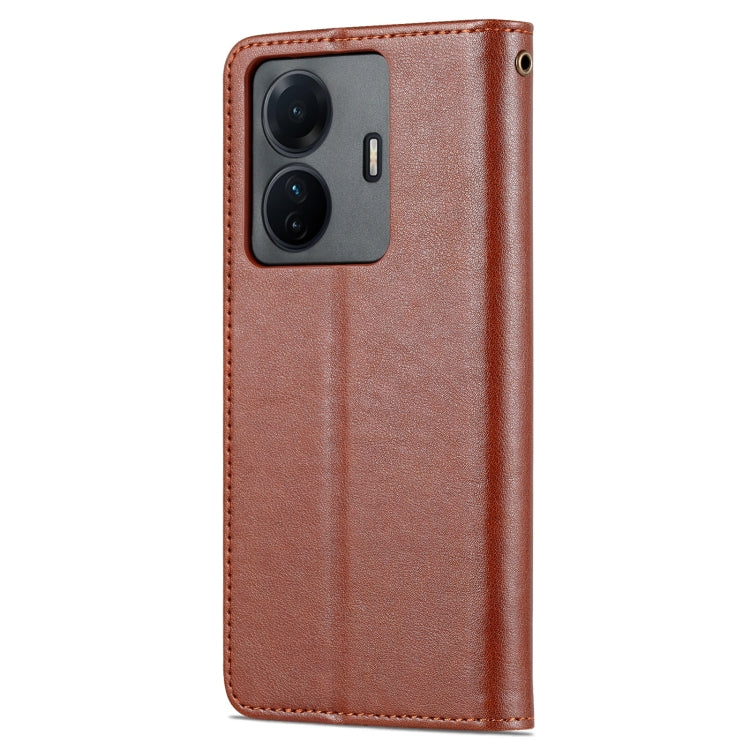 Brown textured flip phone case with camera cutout and stitched border.