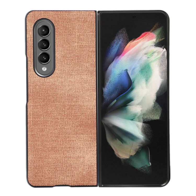 Textured phone case in tan with camera cutouts for three lenses