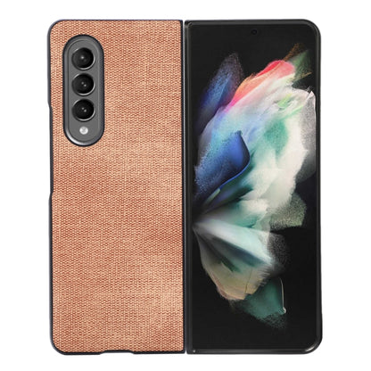 Textured phone case in tan with camera cutouts for three lenses