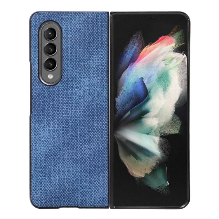Textured phone case in blue with camera cutouts for three lenses