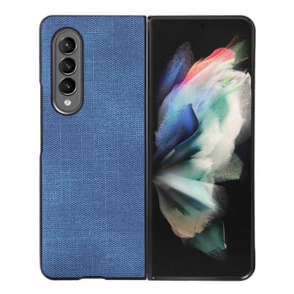 Textured phone case in blue with camera cutouts for three lenses