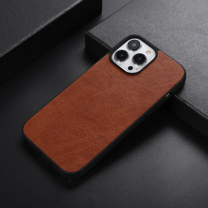 Brown textured shockproof phone case with camera cutouts and raised protective lip.